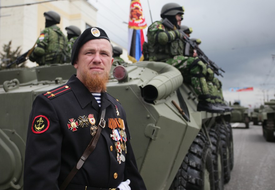 DONETSK, UKRAINE. MAY 9, 2015. Donetsk People's Republic (DPR) militiaman Arsen Pavlov, nicknamed "Motorola" seen ahead of a Victory Day military parade marking the 70th anniversary of the Victory over Nazi Germany in the Great Patriotic War of 1941-1945. Mikhail Sokolov/TASS Óêðàèíà. Äîíåöê. 9 ìàÿ 2015. Âåîííîñëóæàùèé àðìèè ÄÍÐ ñ ïîçûâíûì "Ìîòîðîëà" Àðñåí Ïàâëîâ ïåðåä íà÷àëîì âîåííîãî ïàðàäà, ïîñâÿùåííîãî 70-é ãîäîâùèíå Ïîáåäû â Âåëèêîé Îòå÷åñòâåííîé âîéíå. Ìèõàèë Ñîêîëîâ/ÒÀÑÑ